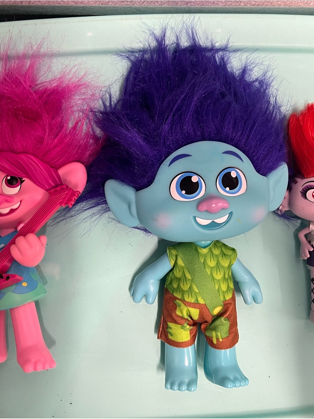 DreamWorks Blue Troll Doll with Purple Hair and Green Outfit